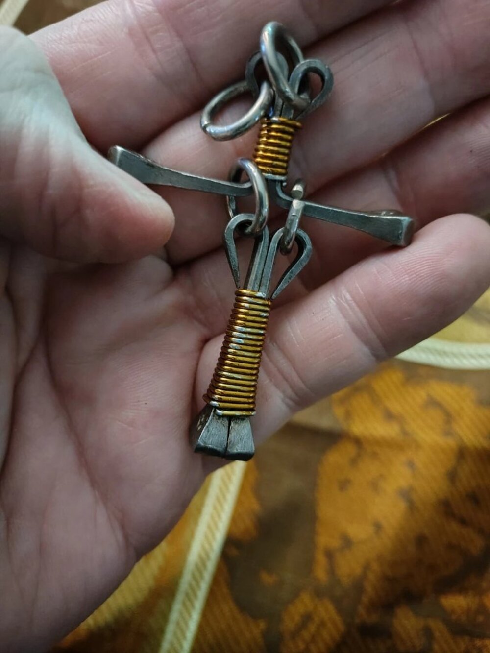 Nail cross pendant